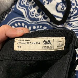 High waisted black skinny ripped jeans